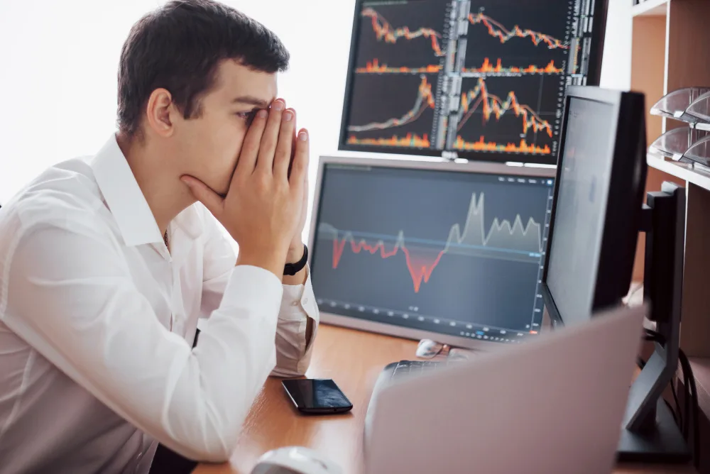 A trader is trying to control his emotions while trading