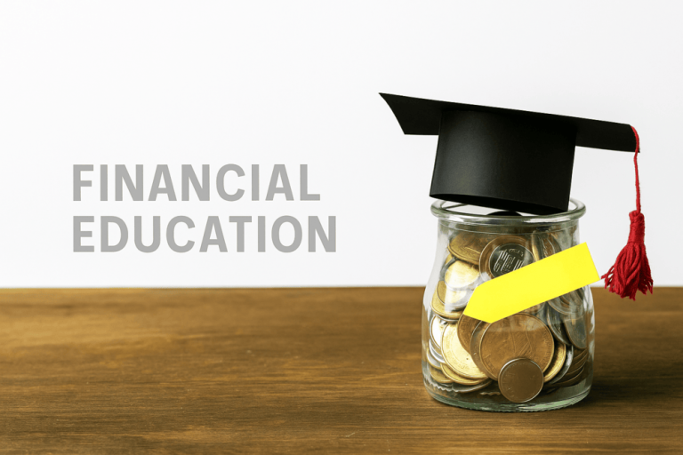 Glass jar filled with coins wearing a black graduation cap with a red tassel, placed on a wooden surface against a white background, with the words "FINANCIAL EDUCATION" in light grey on the left side.